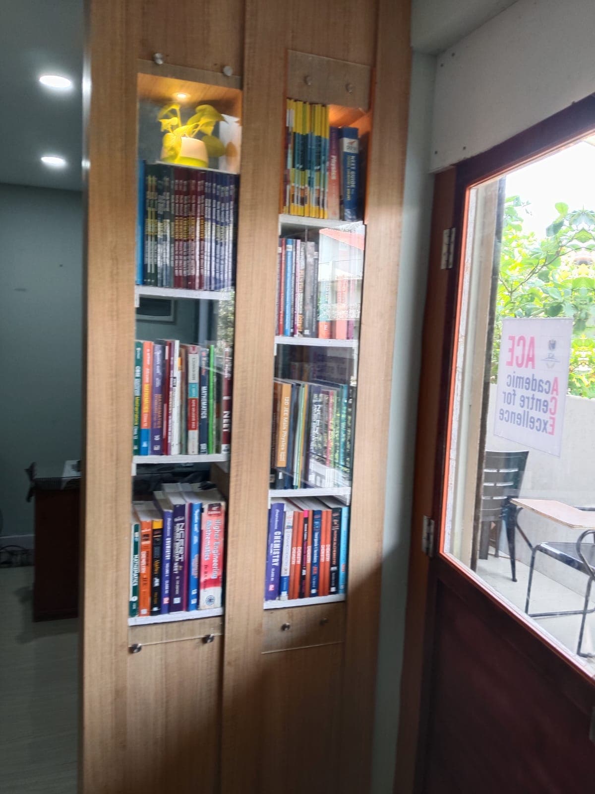 Group of diverse happy students studying in a modern bright classroom